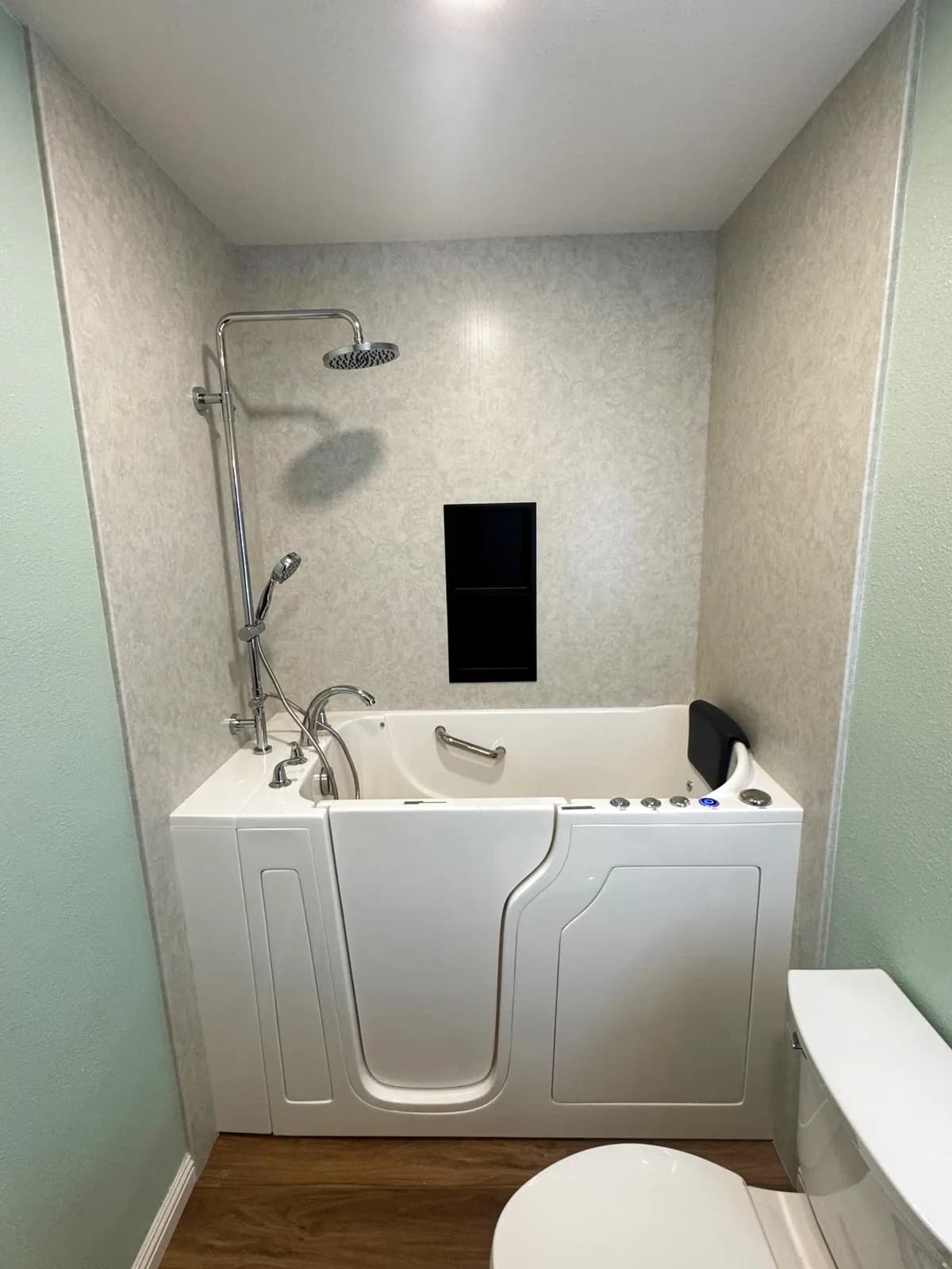 Before and after: Walk-In Tub Conversion with Acrylic Walls, Warm-Wood Vanity and Backlit LED Mirror in Roseville, CA